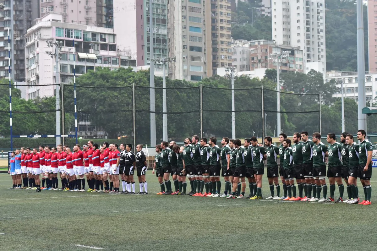 Portugal (green) and Russia (red) line up before the start of their match in the 2015 Cup of Nations in Hong Kong on Friday Nov 13, 2015. (Bill Cox/Epoch Times)