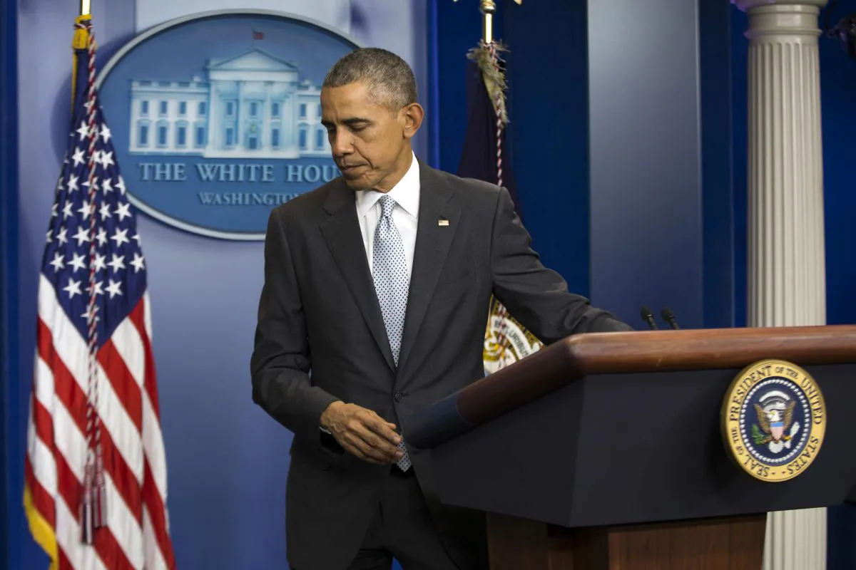 President Barack Obama walks from the podium after speaking about attacks in Paris from the briefing room of the White House, on Nov. 13, 2015, in Washington, D.C. Obama is calling the attacks on Paris an "outrageous attempt to terrorize innocent civilians" and vows to do whatever it takes to help bring the perpetrators to justice. (AP Photo/Evan Vucci)