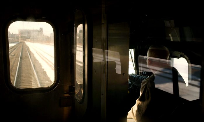A conductor drives an Amtrak train on Feb. 8, 2011, outside of Newark, New Jersey. Amtrak, a government-owned corporation, has joined up with New Jersey's two U.S. senators to propose a new rail link to New York City under the Hudson River. The 'Gateway Project' would include two tunnels under the Hudson River and increase the train traffic under the river from 62 trains per day to 92. This plan is looked at as an alternative after N.J. Governor Chris Christie killed another rail link plan in 2010 after he deemed it too costly to New Jersey residents. (Spencer Platt/Getty Images)