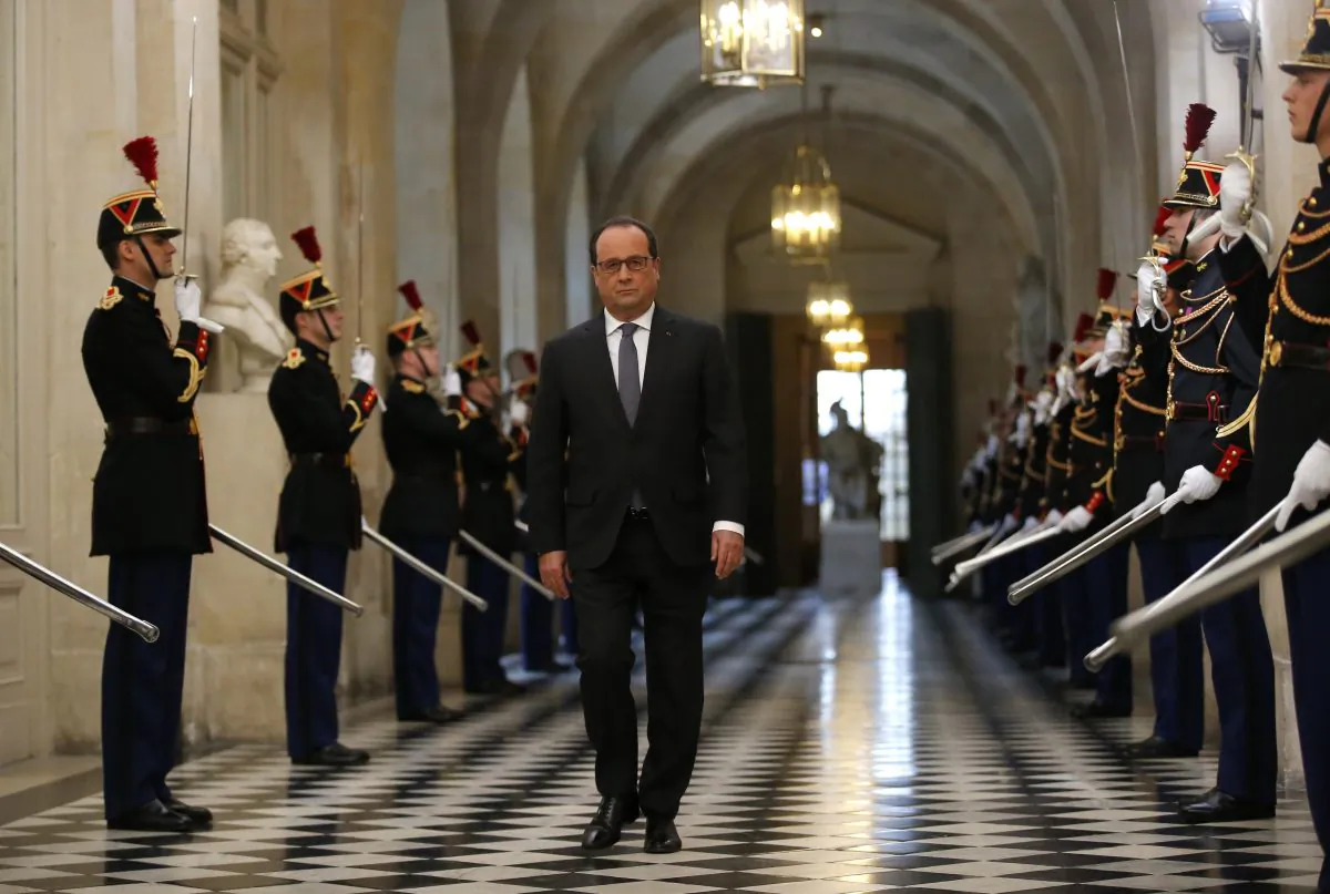 French President Francois Hollande arrives to deliver a speech at the Versailles castle, west of Paris, Monday, Nov.16, 2015. (AP Photo/Michel Euler)
