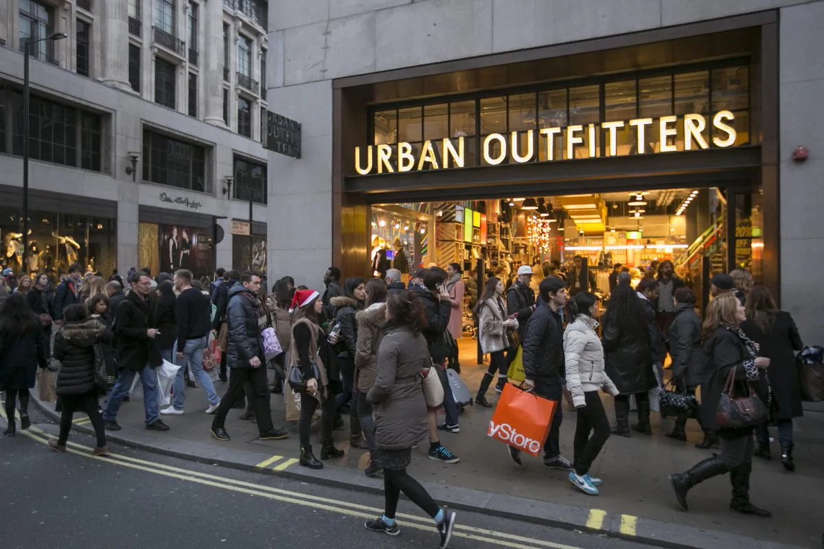 Christmas shoppers walk outside Urban Outfitters in London on Dec. 14, 2013 . (Dan Dennison/Getty Images)