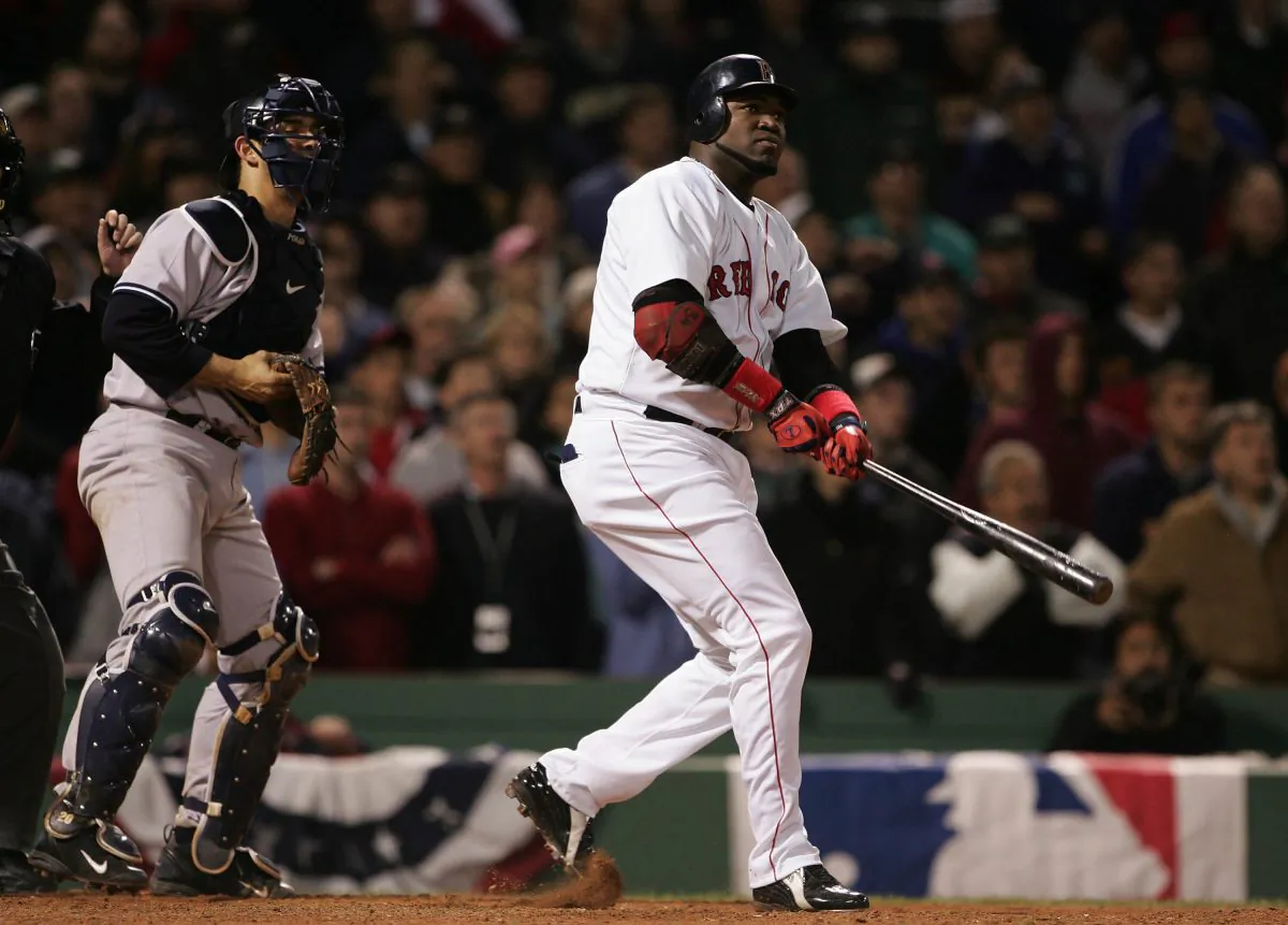 David Ortiz (R) was at his best when it mattered most, leading the Red Sox to three World Series titles. (Doug Pensinger/Getty Images)