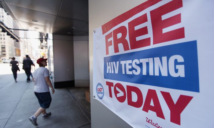 A sign for free HIV testing is seen outside a Walgreens pharmacy in Times Square in New York City on June 27, 2012, National HIV Testing Day. (Mario Tama/Getty Images)