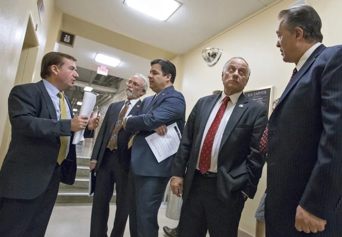 (L-R) House Foreign Affairs Committee Chairman Rep. Ed Royce (R-Calif.), Rep. Dan Newhouse (R-Wash.), Rep. Raul Labrador (R-Idaho), Rep. Steve King (R-Iowa), and Rep. Trent Franks (R-Ariz.) confer on Capitol Hill in Washington, D.C., Wednesday, Nov. 18, 2015, following a meeting of the conservative Republican Study Committee ahead of legislation aimed at increasing screenings for Syrian and Iraqi refugees before they enter the U.S., including a requirement for FBI background checks. (AP Photo/J. Scott Applewhite)