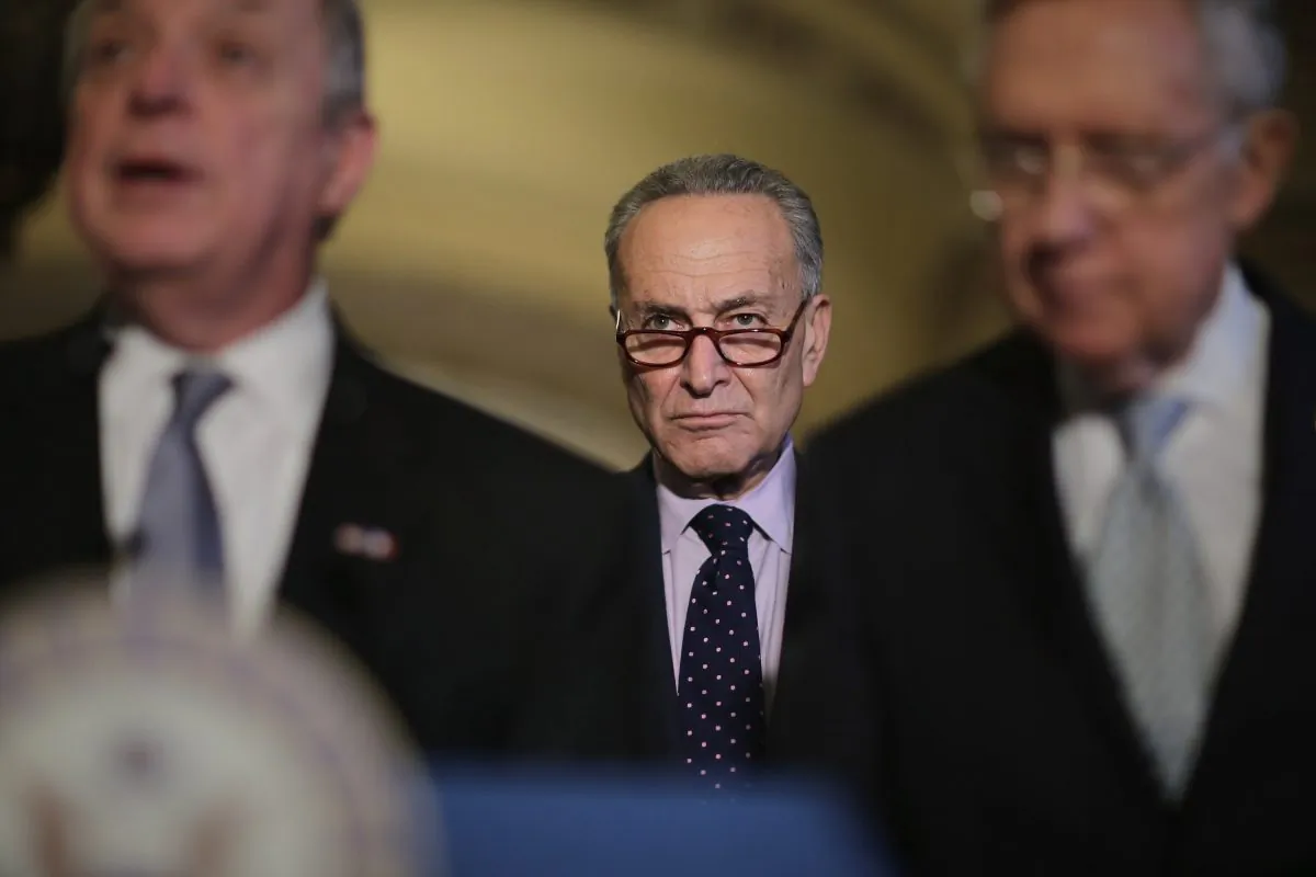 Sen. Charles Schumer (D-N.Y.) (C) joins Senate Minority Whip Richard Durbin (D-Ill.) (L) and Senate Majority Leader Harry Reid (D-N.V.) following the weekly Senate Democratic policy luncheon at the U.S. Capitol in Washington, on Nov. 17, 2015. (Chip Somodevilla/Getty Images)