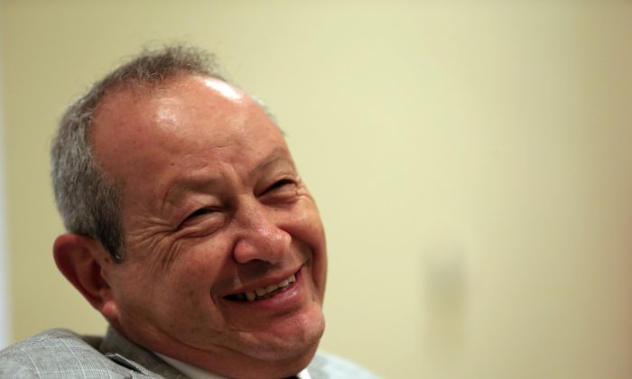 Egyptian billionaire businessman Naguib Sawiris, in a file photo, wants to buy an island for refugees. (AP Photo/Hassan Ammar)