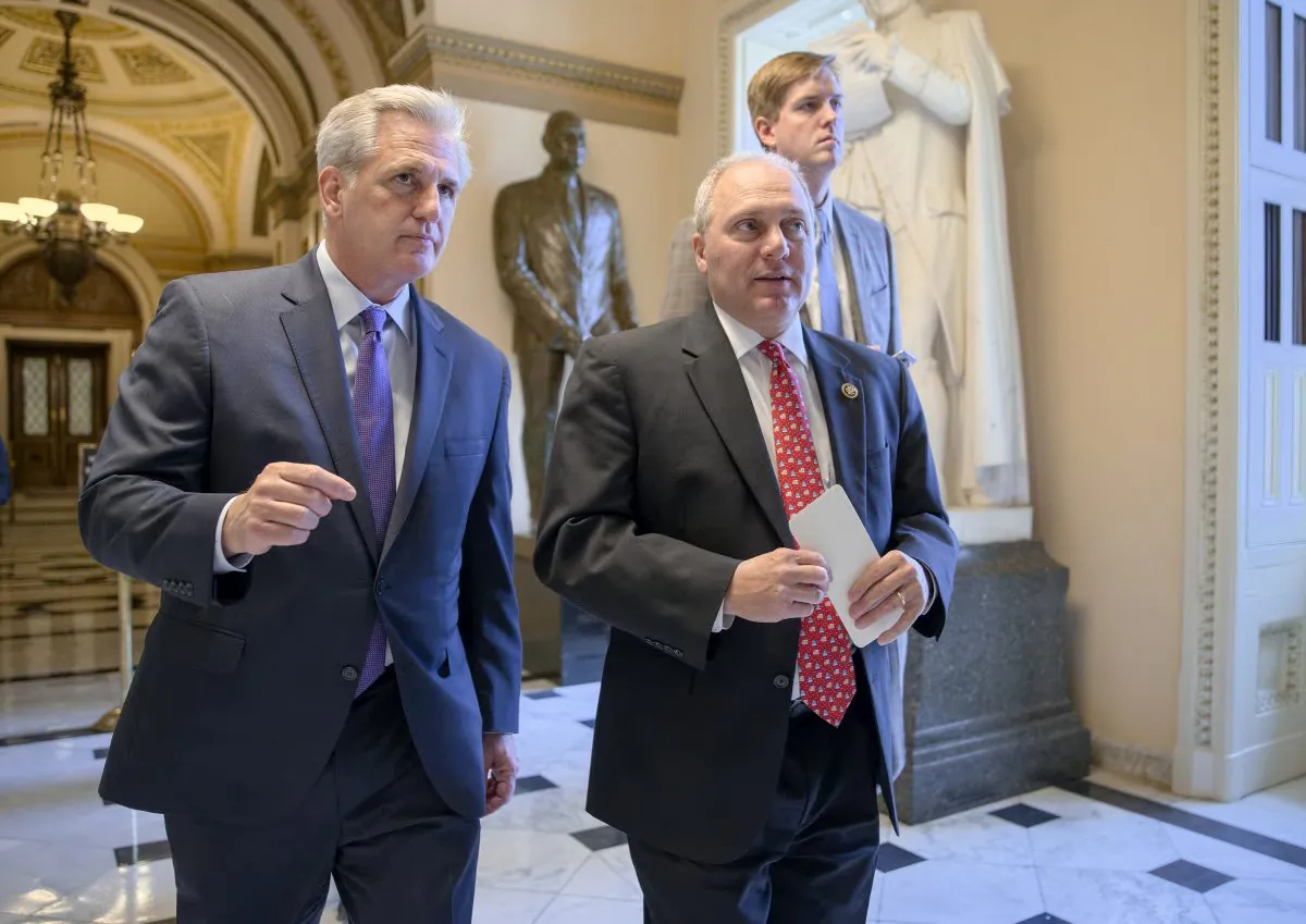 House Majority Leader Kevin McCarthy (R-Calif.), left, and House Majority Whip Steve Scalise (R-La.), stride from the House chamber on Capitol Hill in Washington on Nov. 18, 2015. (AP Photo/J. Scott Applewhite)