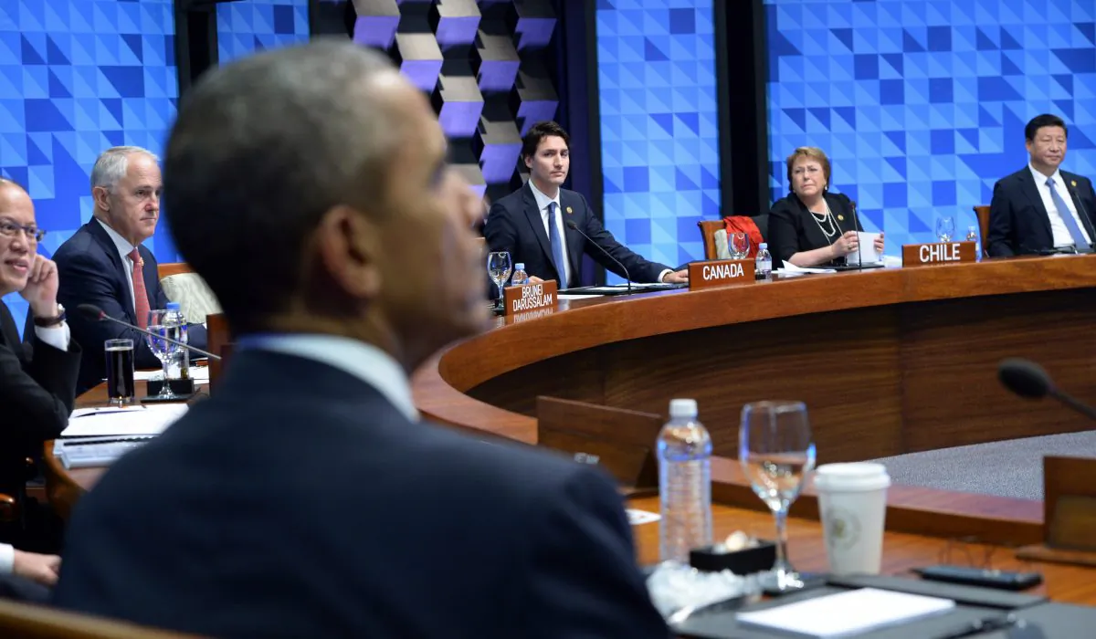 Prime Minister Justin Trudeau, center, takes part in a plenary session at the APEC Summit in Manila, Philippines on Thursday, Nov. 19, 2015. (Sean Kilpatrick/The Canadian Press via AP)