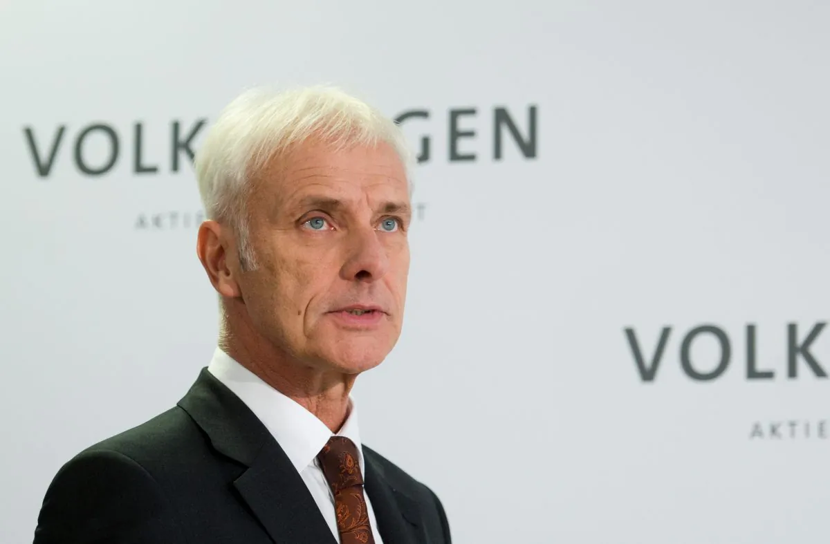 Matthias Mueller, Volkswagen AG CEO, speaks during a news conference in Wolfsburg, Germany, Friday, on Nov. 20, 2015. Mueller says the company's board has decided to reduce capital expenditures by $1.07 billion in 2016 as it deals with the fallout of its emissions-rigging scandal. Mueller said Friday after a meeting of the board at company headquarters in Wolfsburg, German, that the cuts would bring capital expenditure down to $12.8 billion next year. (Julian Stratenschulte/DPA via AP)