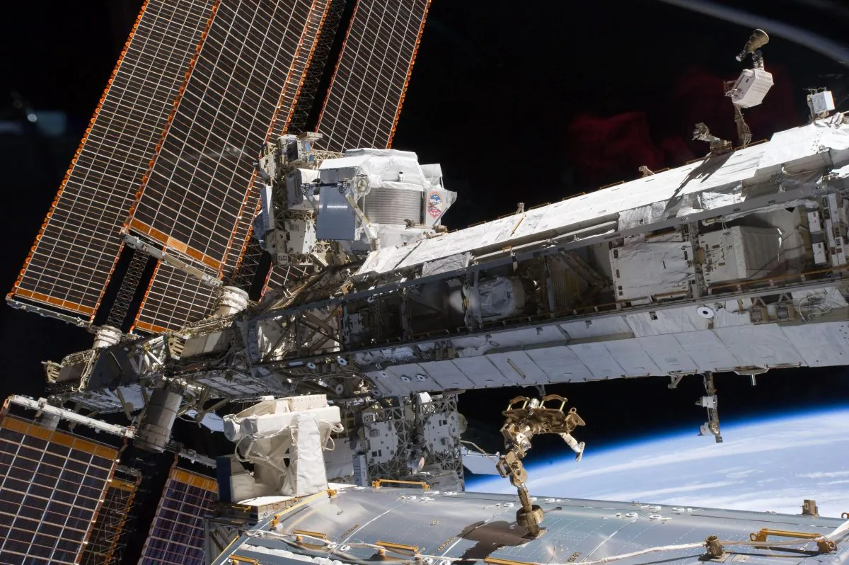 The Alpha Magnetic Spectrometer on the starboard of the International Space Station (NASA). 