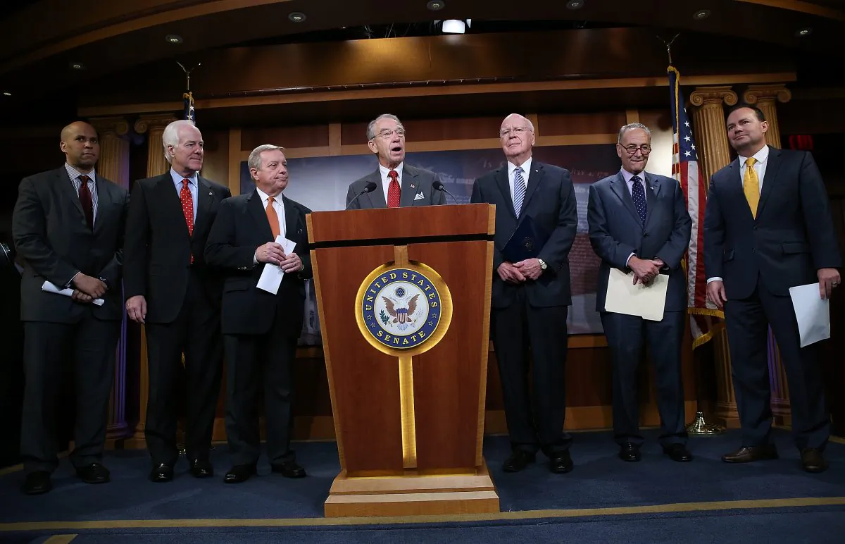 Senate Judiciary Committee Chairman Sen. Chuck Grassley (R-Iowa), center, speaks during a press conference at the U.S. Capitol announcing a bipartisan effort to reform the criminal justice system, in Washington on Oct. 1, 2015. (Win McNamee/Getty Images)
