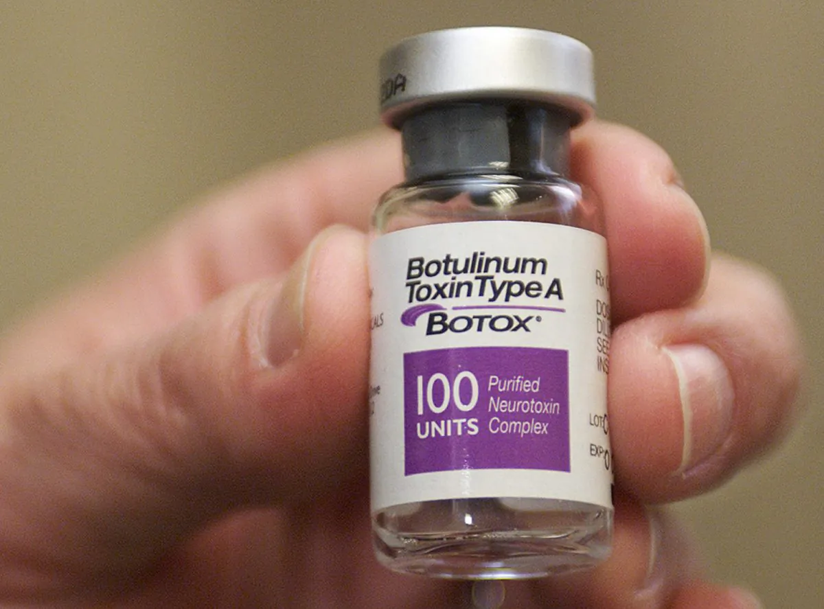 FILE - This March 20, 2002 file photo shows a vial of Botox, made by Allergan, in Beverly Hills, Calif. Pfizer and Allergan have reached a $160 billion deal that creates the world’s largest drugmaker by sales, the companies announced Monday, Nov. 23, 2015. (AP Photo/Damian Dovarganes, File)