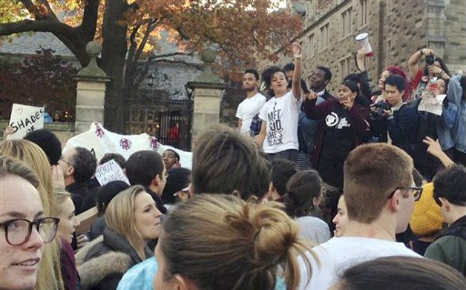 Yale University students and supporters participate in a march across campus to demonstrate against what they see as racial insensitivity at the Ivy League school on Monday, Nov. 9, 2015, in New Haven, Conn. (Ryan Flynn/New Haven Register via AP) 