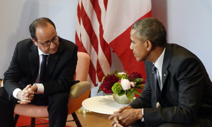 US President Barack Obama (R) and French President Francois Hollande take part in a bilateral meeting on the sidelines of the G7 Summit at the Schloss Elmau castle resort near Garmisch-Partenkirchen, in southern Germany on June 8, 2015. (Alain Jocard/AFP/Getty Images)
