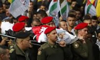 2 Palestinians Die in Clashes; Israel Toughens Fence