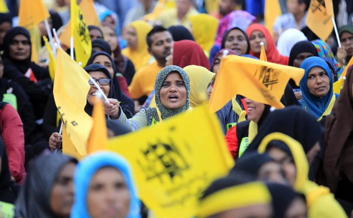 Supporters of former Maldivian president Mohamed Nasheed participate in a protest rally in Male, Maldives, Friday, Nov. 27, 2015. Hundreds of opposition supporters have started a three-day long protest demanding the release of the country’s ex-president and other politicians and activists in jail. (AP Photo/Sinan Hussain)