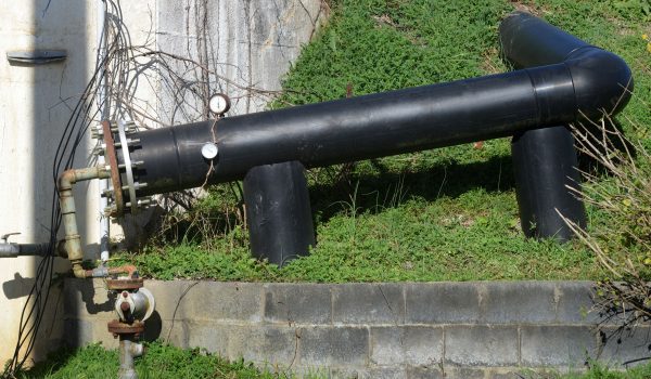 This Nov. 19, 2015, photo shows methane gas from the Bristol Virginia Landfill entering the power plant though this large black pipe. (David Crigger/Bristol Herald-Courier via AP)