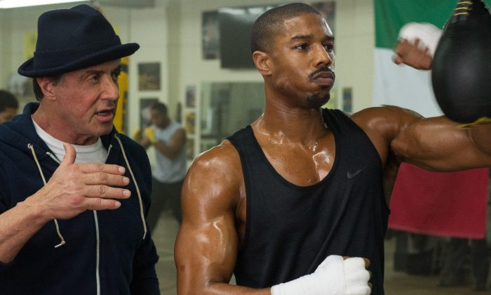 Michael B. Jordan (R) as Adonis Johnson and Sylvester Stallone as Rocky Balboa in Metro-Goldwyn-Mayer Pictures', Warner Bros. Pictures' and New Line Cinema's drama "Creed," a Warner Bros. Pictures release. The movie opened in U.S. theaters on Nov. 25, 2015. (Barry Wetcher/Warner Bros. Pictures via AP)