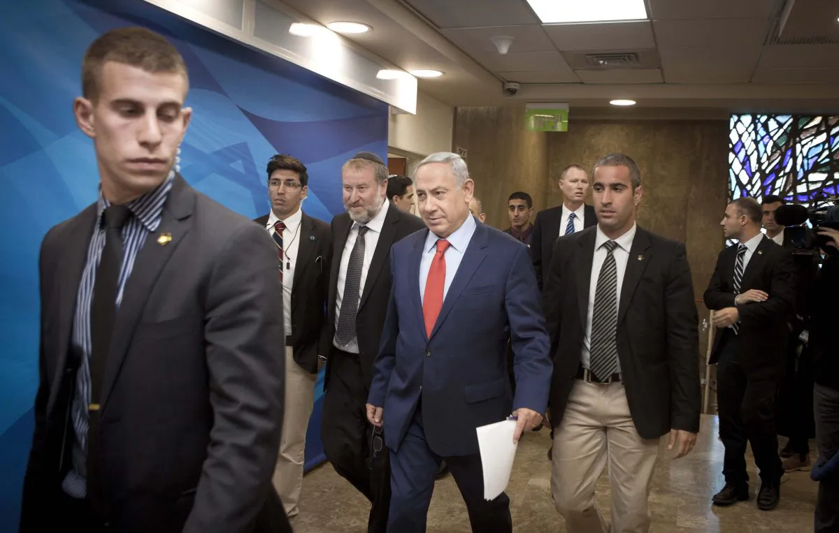 Israeli Prime Minister Benjamin Netanyahu arrives for the weekly cabinet meeting in Jerusalem on Nov. 29, 2015. (Dan Balilty/AP)