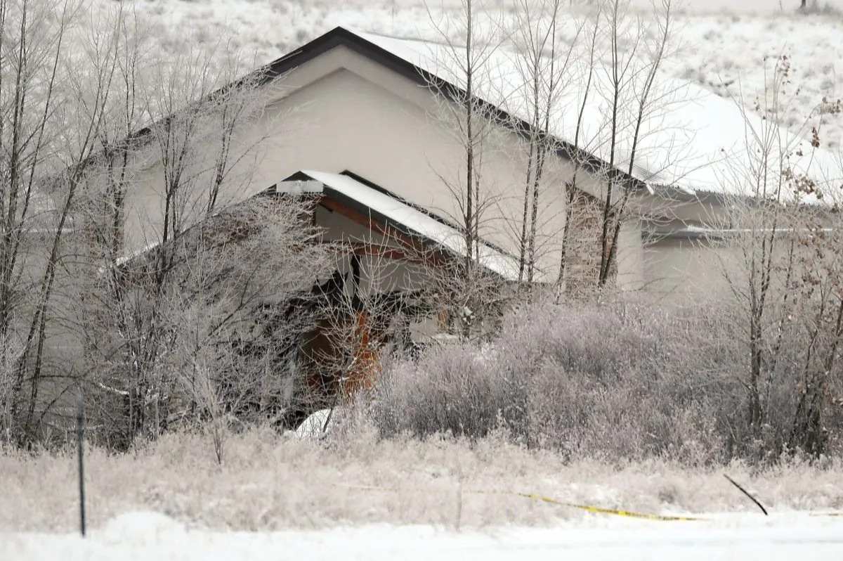 The Planned Parenthood clinic in Colorado Springs, Colo. shows the signs of Friday's standoff as law enforcement officers continue the investigation on Saturday, Nov. 28, 2015, following yesterday's shooting. (Daniel Owen/The Gazette via AP)