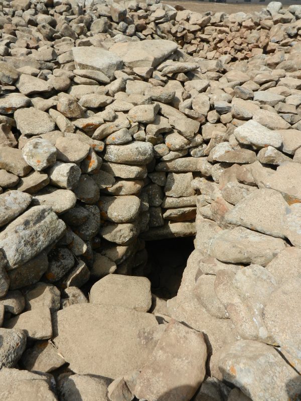 The dark entrance to the burial chamber found at the center of the megalithic site. (Ani Nimi/CC BY-SA)