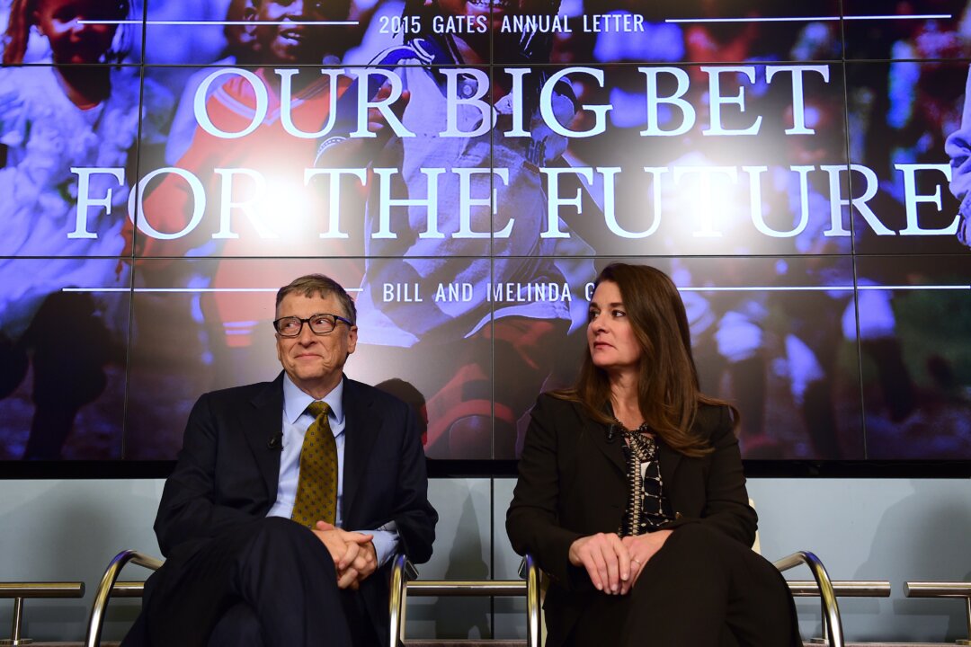 Bill and Melinda Gates (R), founders of the Bill and Melinda Gates Foundation, take part in a discussion organized by British magazine The Economist about expected breakthroughs in the next 15 years in health, education, farming and banking, in Brussels on Jan. 22, 2015. (Emmanuel Dunand/AFP/Getty Images)