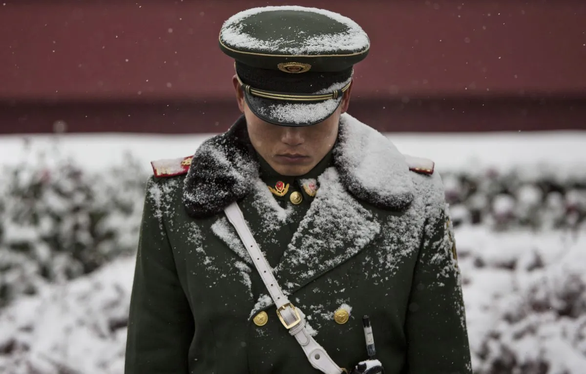 A Chinese paramilitary police officer stands guard outside Tiananmen Gate in Beijing, China, on Nov. 22, 2014. (Kevin Frayer/Getty Images)