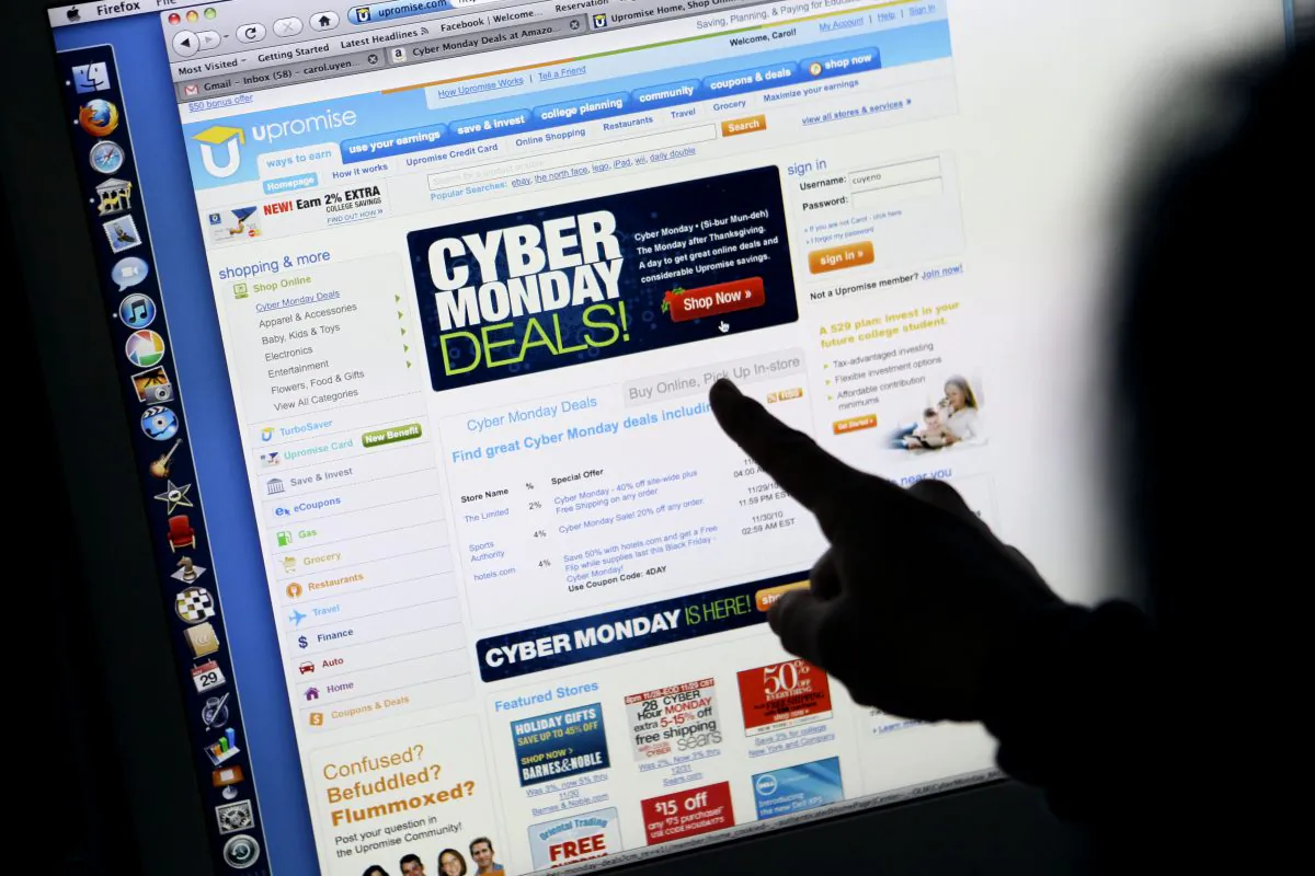 A consumer looks at Cyber Monday sales on her computer at her home in Palo Alto, Calif., no Nov. 29, 2010. Retailers are rolling out online deals on so-called "Cyber Monday." But now that shoppers are online all the time anyway, the 10-year-old shopping holiday is losing some of its luster. (AP Photo/Paul Sakuma)