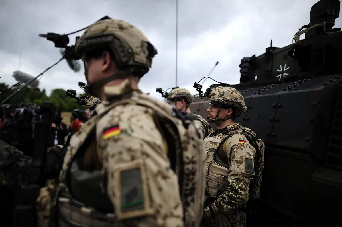 German Defense Minister Ursula von der Leyen inspects a new Puma light tank during a ceremony of the German armed forces, the Bundeswehr, in Unterluess, near Uelzen, Germany, on June 24, 2015. (Alexander Koerner/Getty Images)