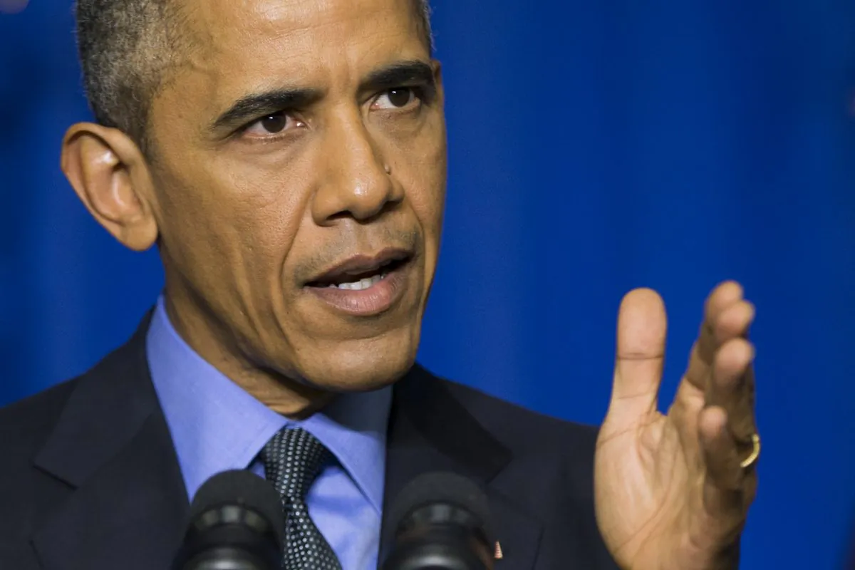 President Barack Obama speaks during a news conference at the Organization for Economic Cooperation and Development (OECD) center, in Paris, on Tuesday, Dec. 1, 2015. Obama discussed the COP21 climate change summit and the threat of terrorism from the Islamic State. (AP Photo/Evan Vucci)