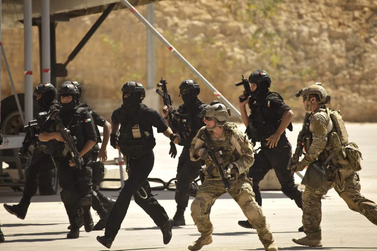 Special operations forces from Jordan and the United States conduct a combined demonstration with commandos from Iraq on June 20, 2013. (Maya Alleruzzo/AP)