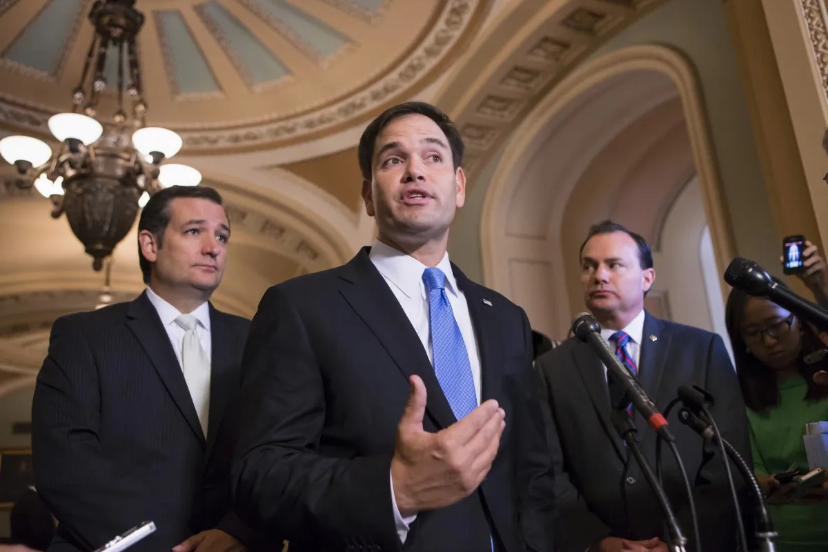 Sen. Marco Rubio (R-Fla.) (C), Sen. Ted Cruz (R-Texas) (L), and Sen. Mike Lee (R-Utah) at a news conference on Capitol Hill in Washington, D.C., on Sept. 27, 2013. (AP Photo/J. Scott Applewhite)