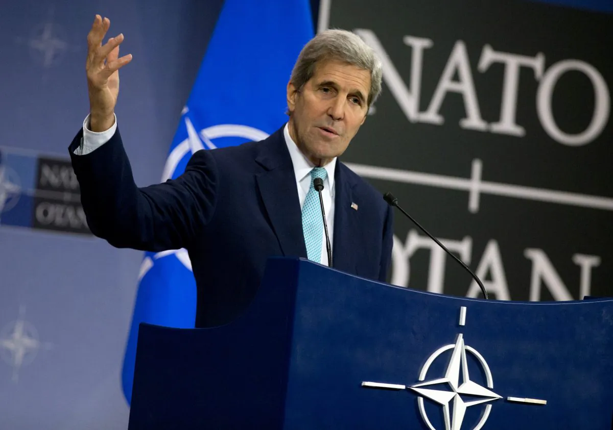Secretary of State John Kerry speaks at a media conference at NATO headquarters in Brussels on Wednesday, Dec. 2, 2015. (AP Photo/Virginia Mayo)