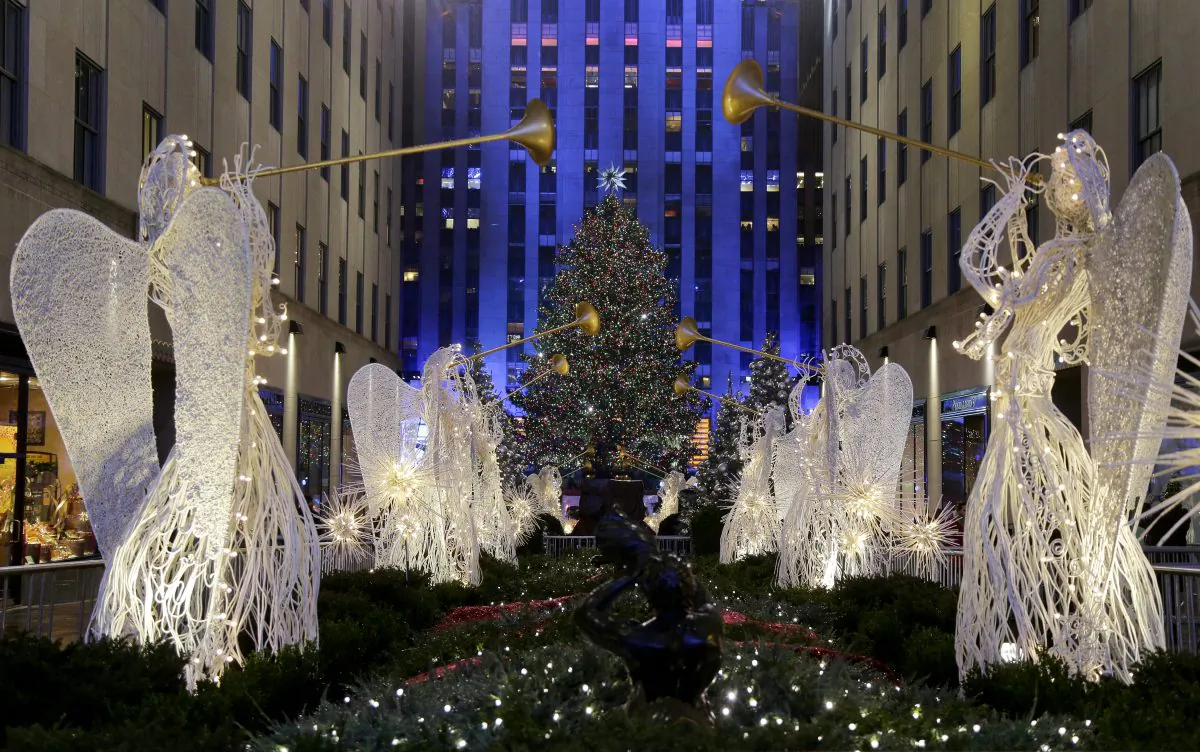 The Norway spruce tree is lit with about 45,000 multi-colored LED lights during the Rockefeller Center Christmas tree lighting ceremony on Dec. 2, 2015. (Julie Jacobson/AP)