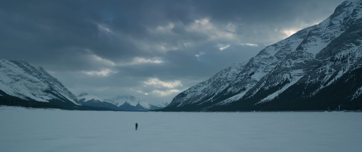 man on frozen lake in the revenant