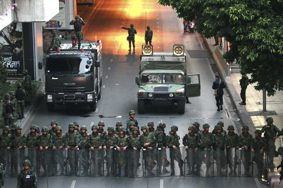 In this May 26, 2014 file photo, Thai soldiers secure a road near the Victory Monument in Bangkok, Thailand. (AP Photo/Wason Wanichakorn)