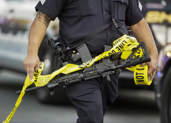 Crime scene in California. (AP Photo/Damian Dovarganes)