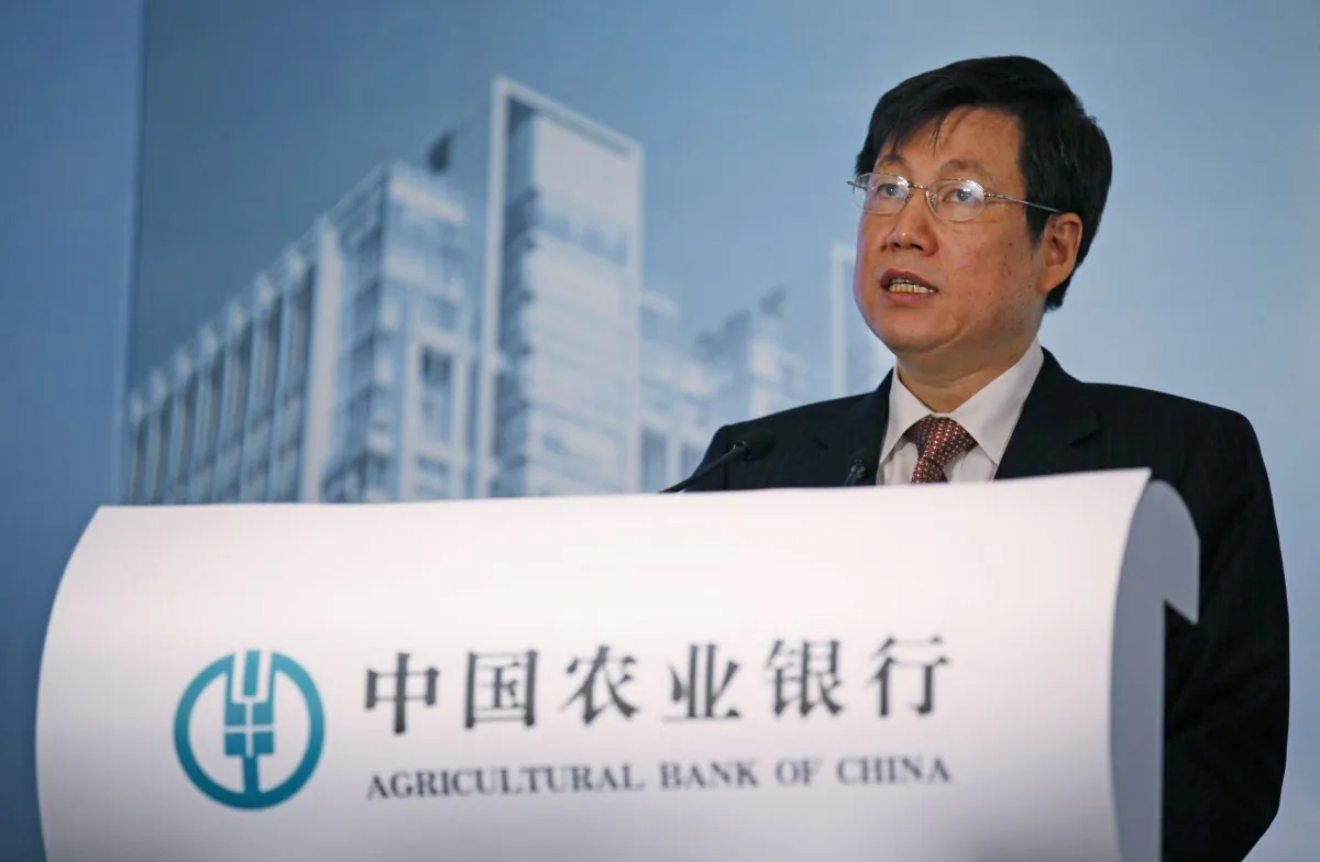Zhang Yun, vice chairman and president of the Agricultural Bank of China, at a news conference on its initial public offering in Hong Kong on June 29, 2010. Zhang, the head of China's fourth-largest state bank, has resigned citing personal reasons according to reports appearing Saturday, Dec. 5, 2015. (AP Photo/Kin Cheung)