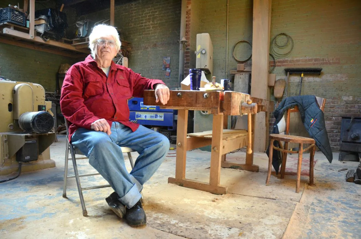 Sam Forrest on Nov. 21, 2015, at his Brookland Park Boulevard shop in Richmond, Va., where he made his latest collection of furniture. (Zachary Reid/Richmond Times-Dispatch via AP)