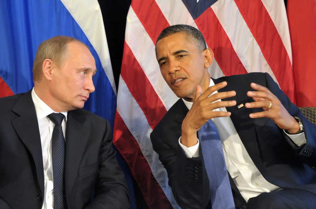 President Barack Obama (R) meets his Russian President Vladimir Putin (L) in Los Cabos, Mexico, on June 18, 2012, during the G20 leaders Summit to discuss differences over what to do about the bloody conflict in Syria. (Alexei Nikolsky/AFP/Getty Images)