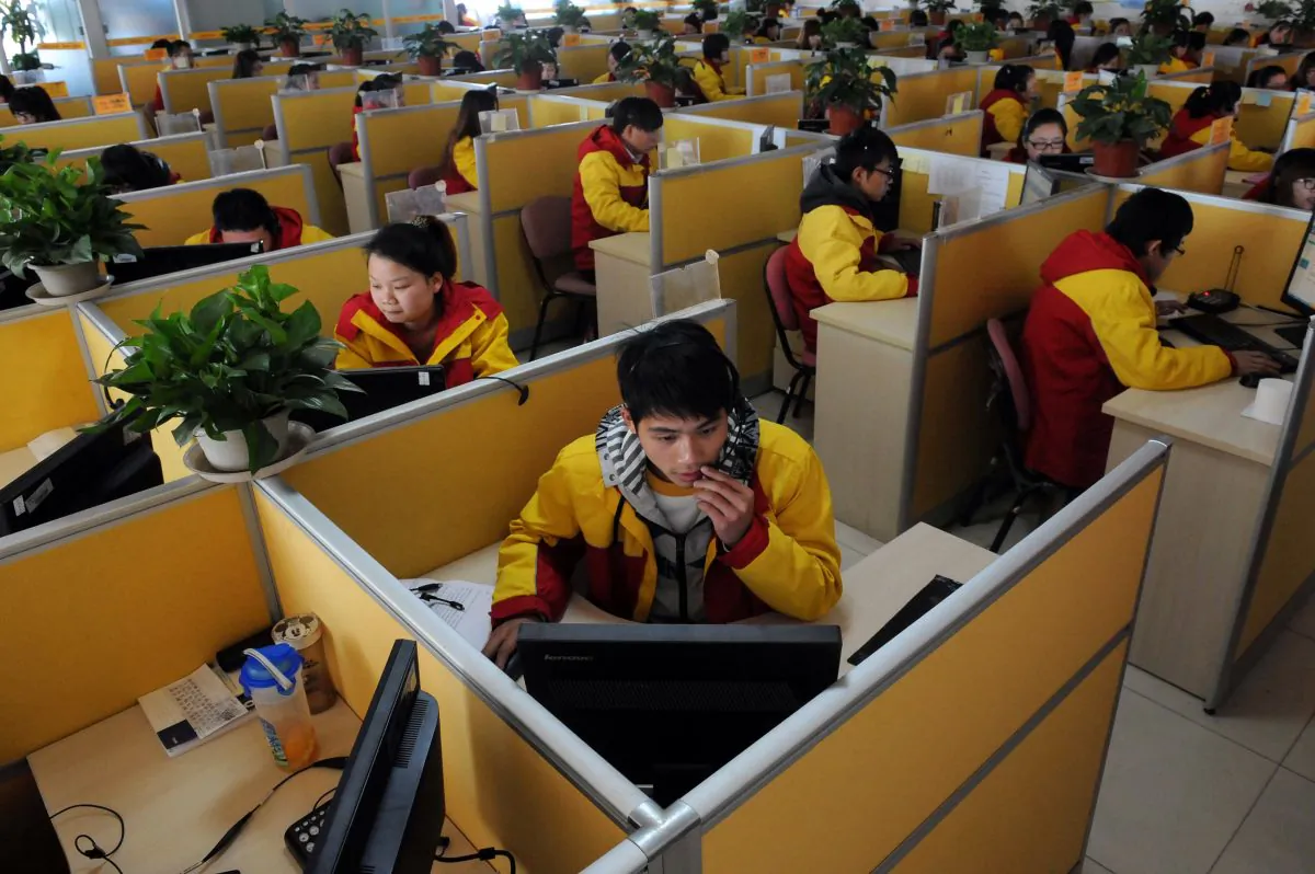Workers check deliveries in Beijing in 2013 the day after "Singles Day," which falls on Nov. 11 each year. Chinese are increasingly spending big in online shopping on Singles Day. (STR/AFP/Getty Images)