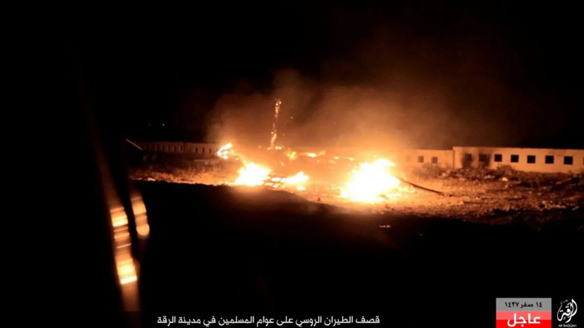 Cars burning after Russian airstrikes that targeted civilian areas, in Raqqa, Syria, on Nov. 27, 2015. A new wave of airstrikes targeting the Syrian city of Raqqa, the headquarters of the extremist Islamic State and the focus of an international military campaign, killed several people, including children, Syrian opposition groups said Friday. The Arabic caption on the bottom picture reads:"Russian airstrikes on the Muslims in Raqqa City." (Militant Amaq news agency via AP)