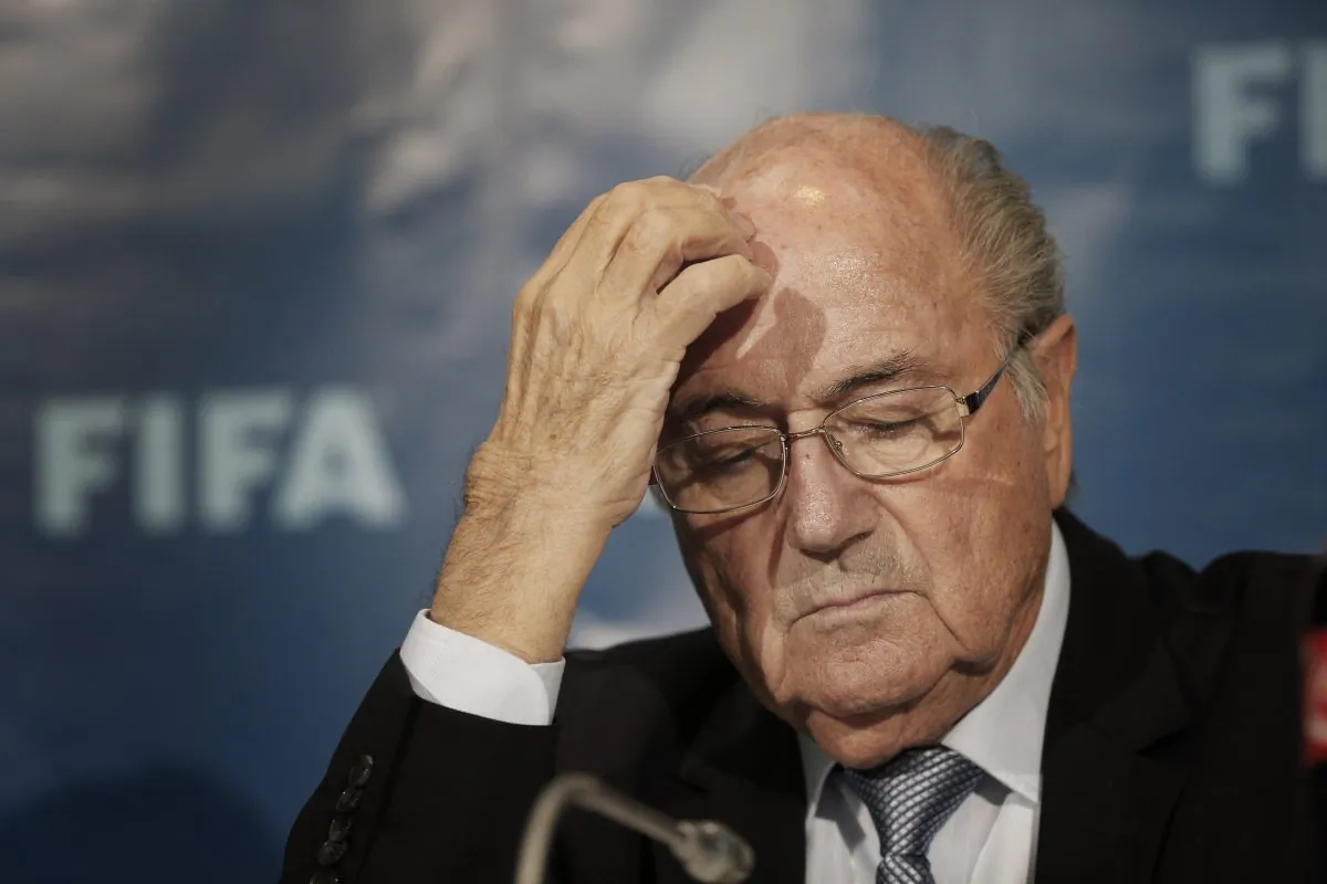FIFA President Sepp Blatter gestures as he attends a news conference in Marrakech, Morocco, on Dec. 19, 2014. The FBI is investigating Blatter's role in a kickbacks scandal that involved his predecessor as FIFA president, Joao Havelange, the BBC reported on Dec. 6, 2015. (AP Photo/Christophe Ena)