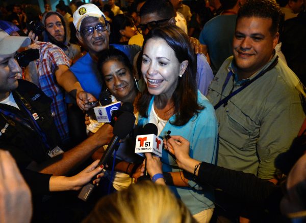 Venezuelan opposition ex-congresswoman Maria Corina Machado speaks with the press following the results of the legislative election in Caracas, on Dec. 7, 2015. (Federico Parra/AFP/Getty Images)