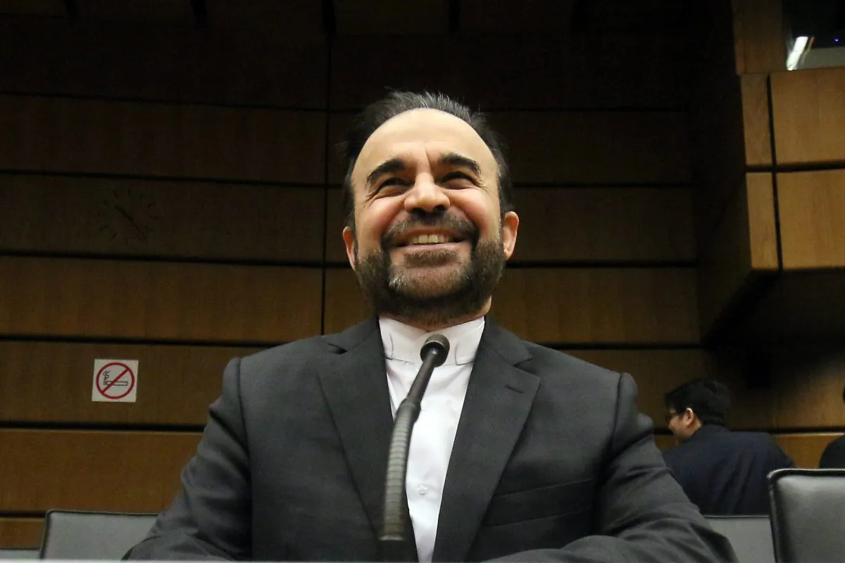 Iran's Ambassador to the International Atomic Energy Agency (IAEA), Reza Najafi waits for the start of the IAEA board of governors meeting at the International Center, in Vienna, Austria, Thursday, Nov, 26, 2015. (AP Photo/Ronald Zak)