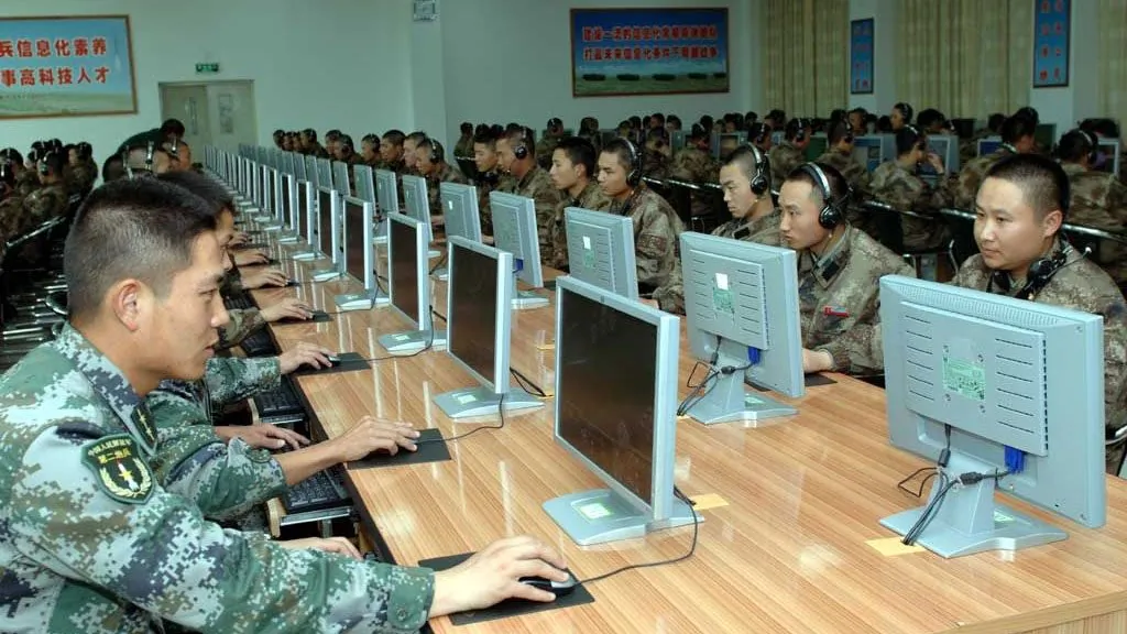 Chinese soldiers work at computers. Cyberattacks from China have continued despite agreements from the CCP to stop.(mil.huanqiu.com)