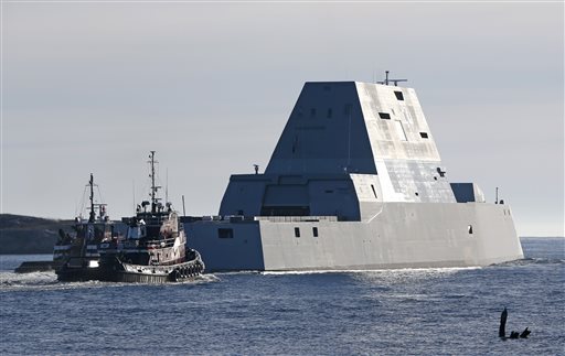 The first Zumwalt-class destroyer, the USS Zumwalt , the largest ever built for the U.S. Navy, leaves the Kennebec River, Monday, Dec. 7, 2015, in Phippsburg, Maine. The futuristic ship is headed out to sea for the first time to undergo sea trials.(AP Photo/Robert F. Bukaty)