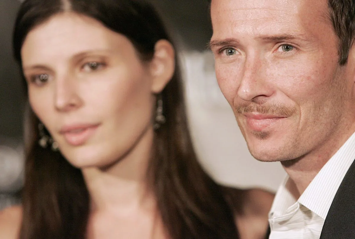 Singer Scott Weiland, right, and wife Mary Forsberg, left, pose on the red carpet during the William Rast Fashion Show at the Social Hollywood nightclub in Los Angeles, Calif. on Tuesday, October 17, 2006. Weiland and Forsberg were on hand to support Singer Justin Timberlake, a partner in the William Rast clothing line. (AP Photo/Dan Steinberg)