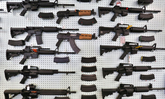 Guns are displayed for sale at Dragonman's shooting range and gun store east of Colorado Springs, Colo., on July 20, 2014. (Brennan Linsley/AP Photo)
