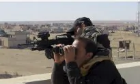Iraqi Forces Seize Neighborhood on Outskirts of ISIS-Held City